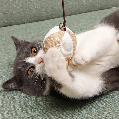 Canne à pêche en bois avec pendentif à plumes